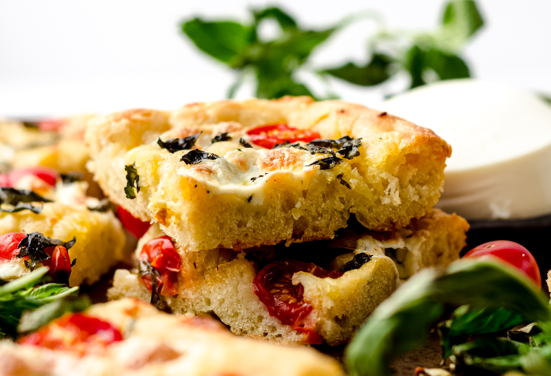 A stack of caprese focaccia.