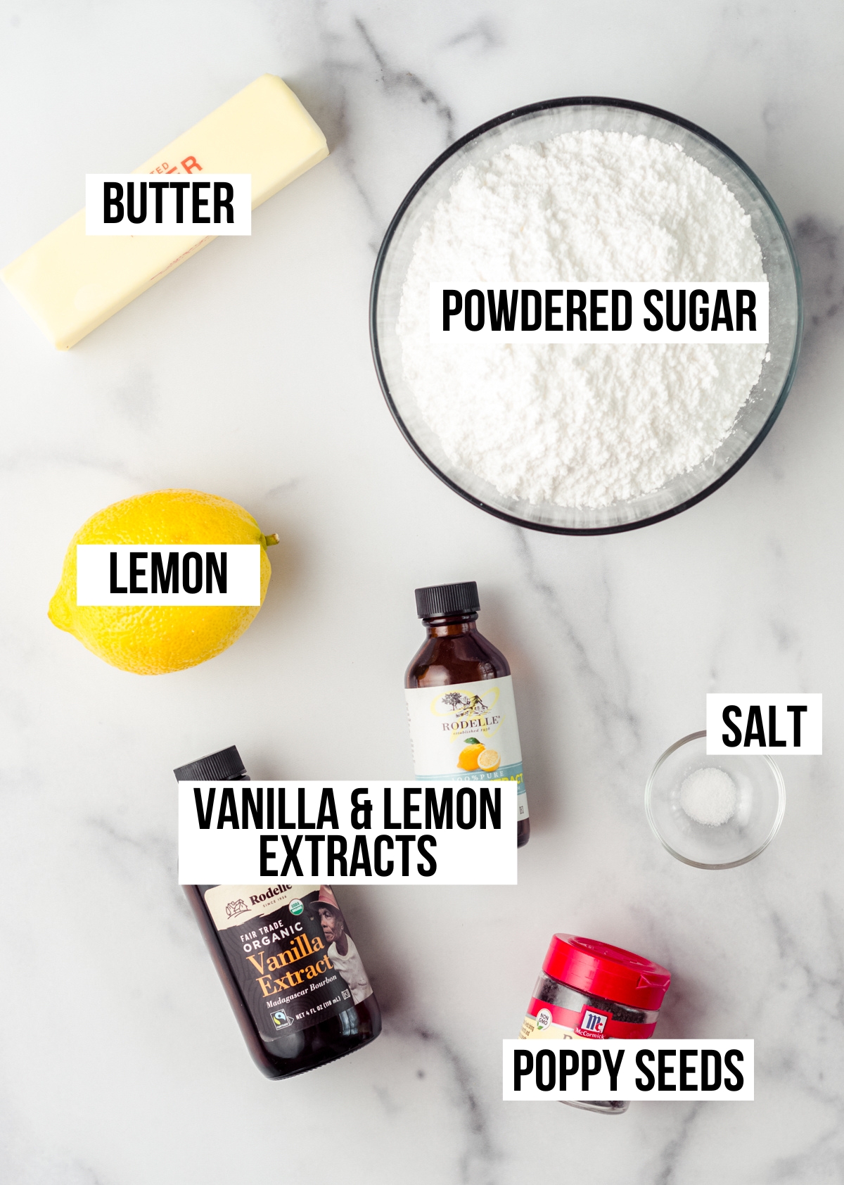 Aerial photo of lemon poppy seed frosting ingredients with text overlay.