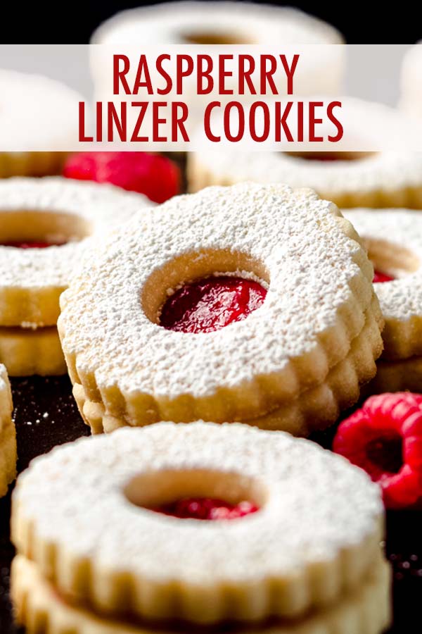 Fresh homemade raspberry spread gets sandwiched between two tender almond flour cookies in this classic Linzer cookie recipe. via @frshaprilflours