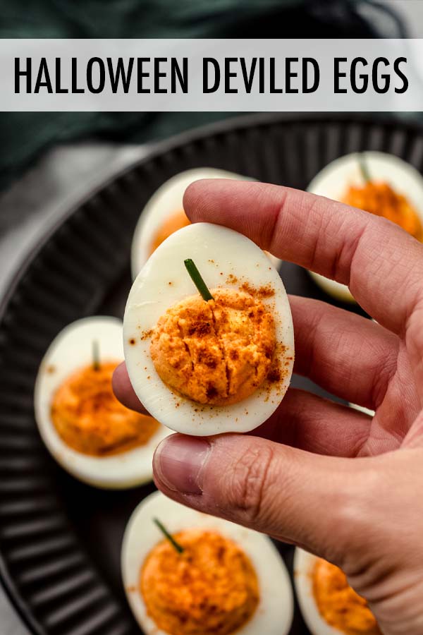 Turn your traditional deviled eggs into Halloween deviled eggs by creating adorable pumpkins with the filling! via @frshaprilflours