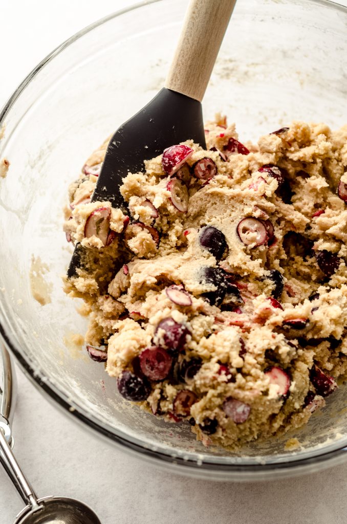 Fresh cranberry cookie dough in a bowl.