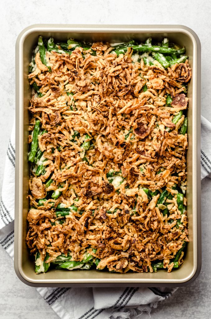 Aerial photo of green bean casserole without mushrooms in a baking dish.