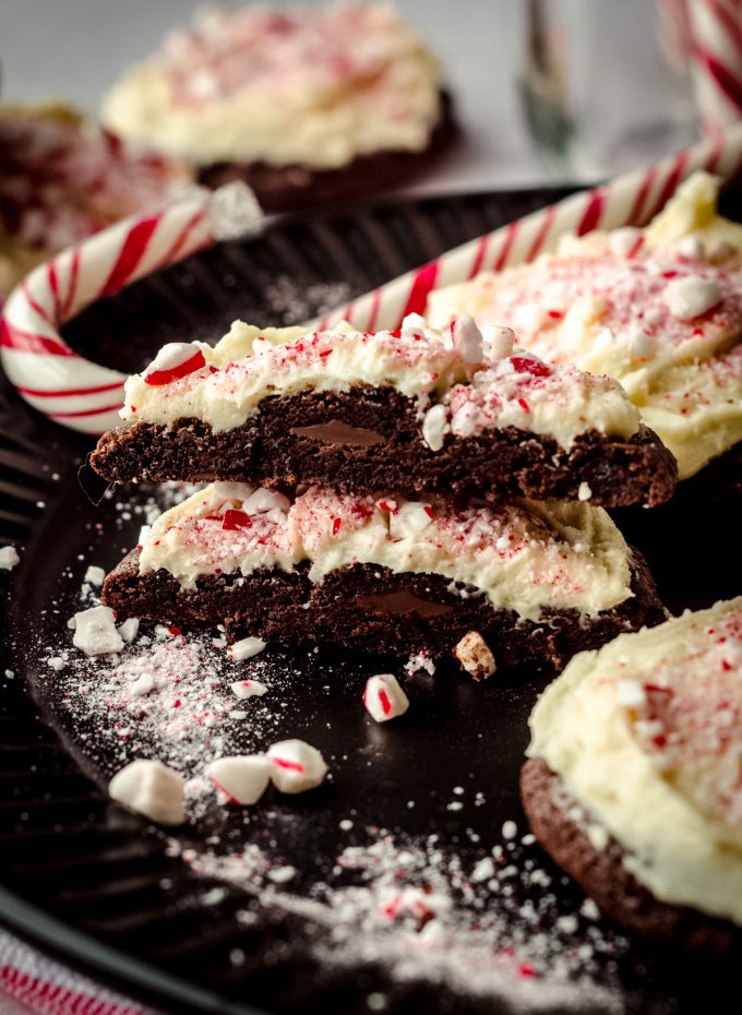 A peppermint bark cookie cut in half so you can see the inside of the cookie.