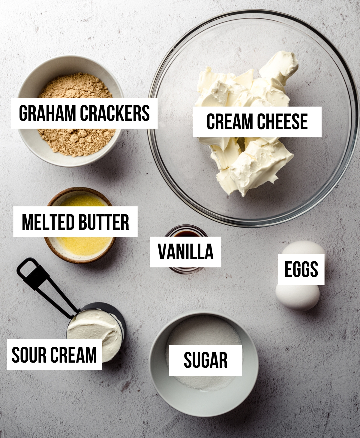 Aerial photo of ingredients for an Instant Pot cheesecake with text overlay.