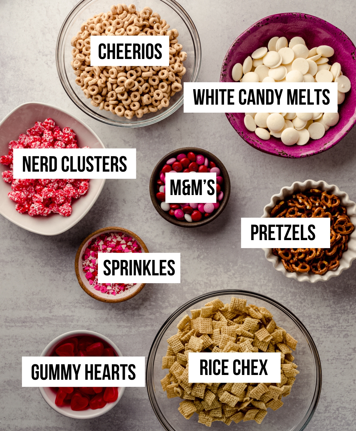 Aerial photo of ingredients for Valentine's Day snack mix with text overlay.