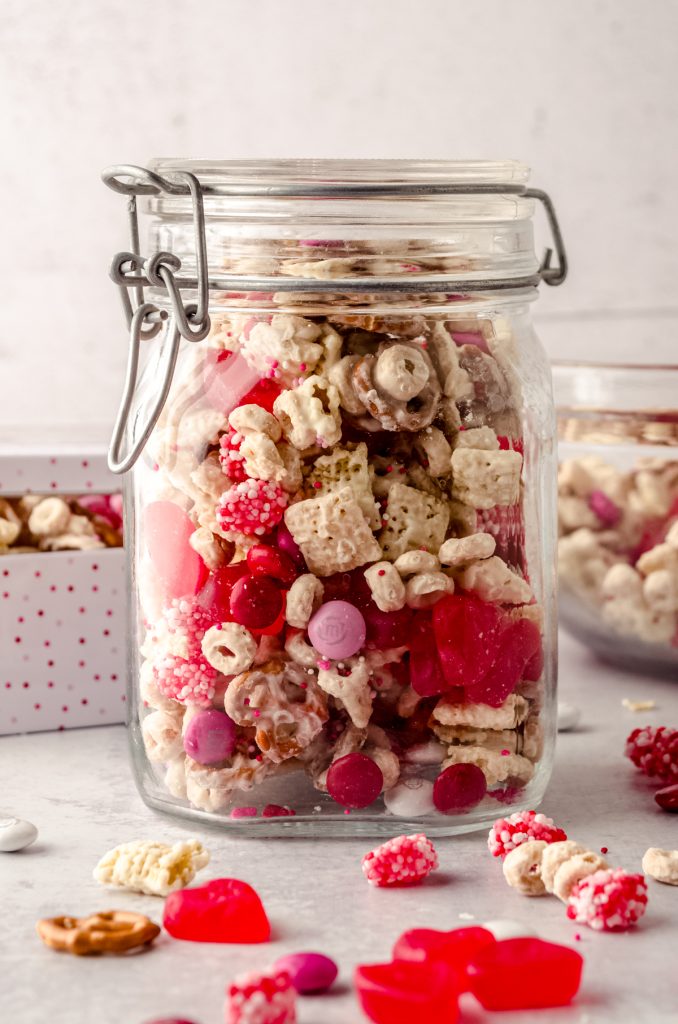 Valentine snack mix in a candy jar.