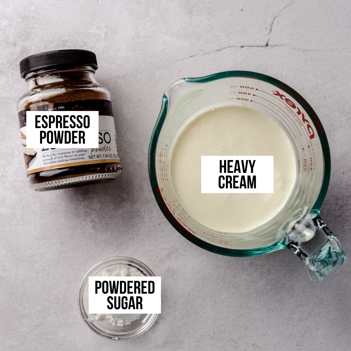 Aerial photo of ingredients for coffee whipped cream with text overlay labeling each ingredient.