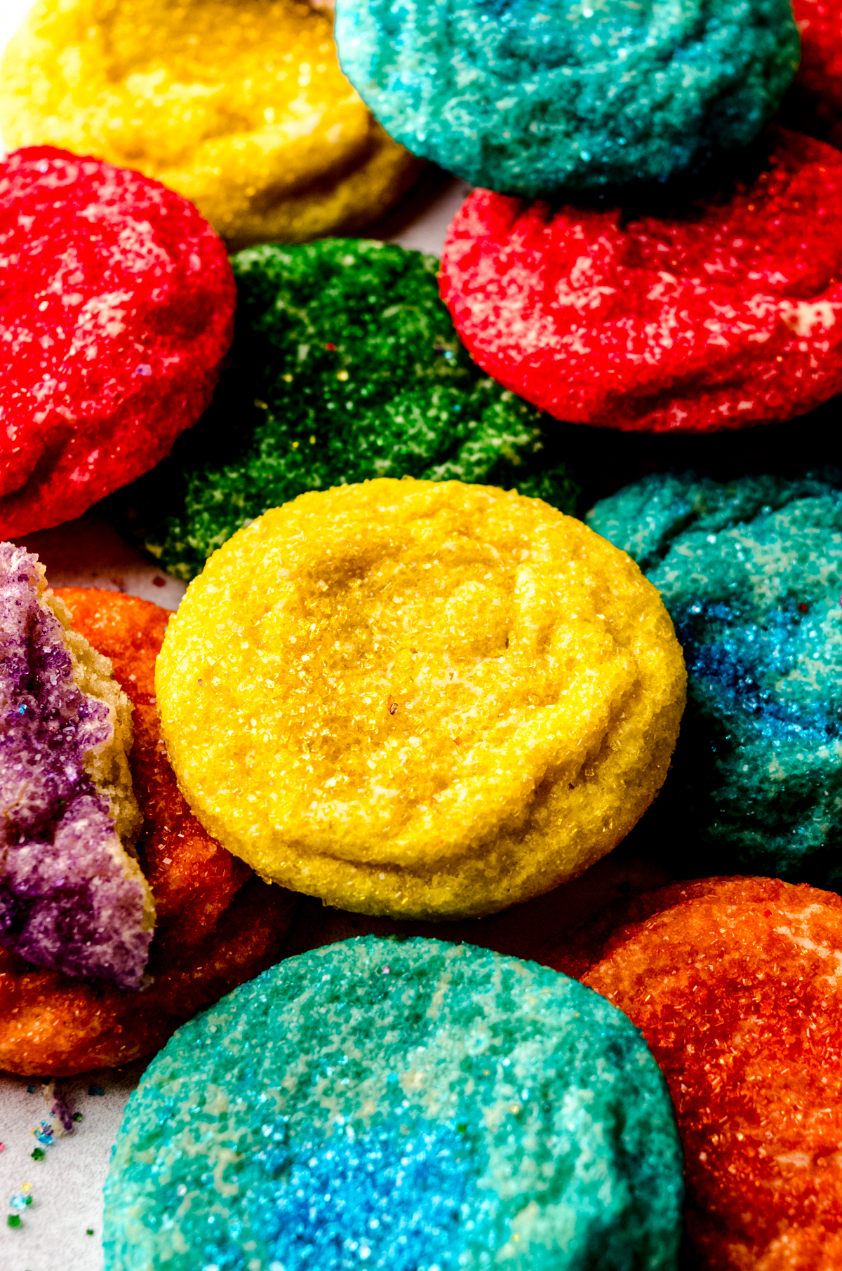 Aerial photo of sugar cookies that have been rolled in colored sugar.