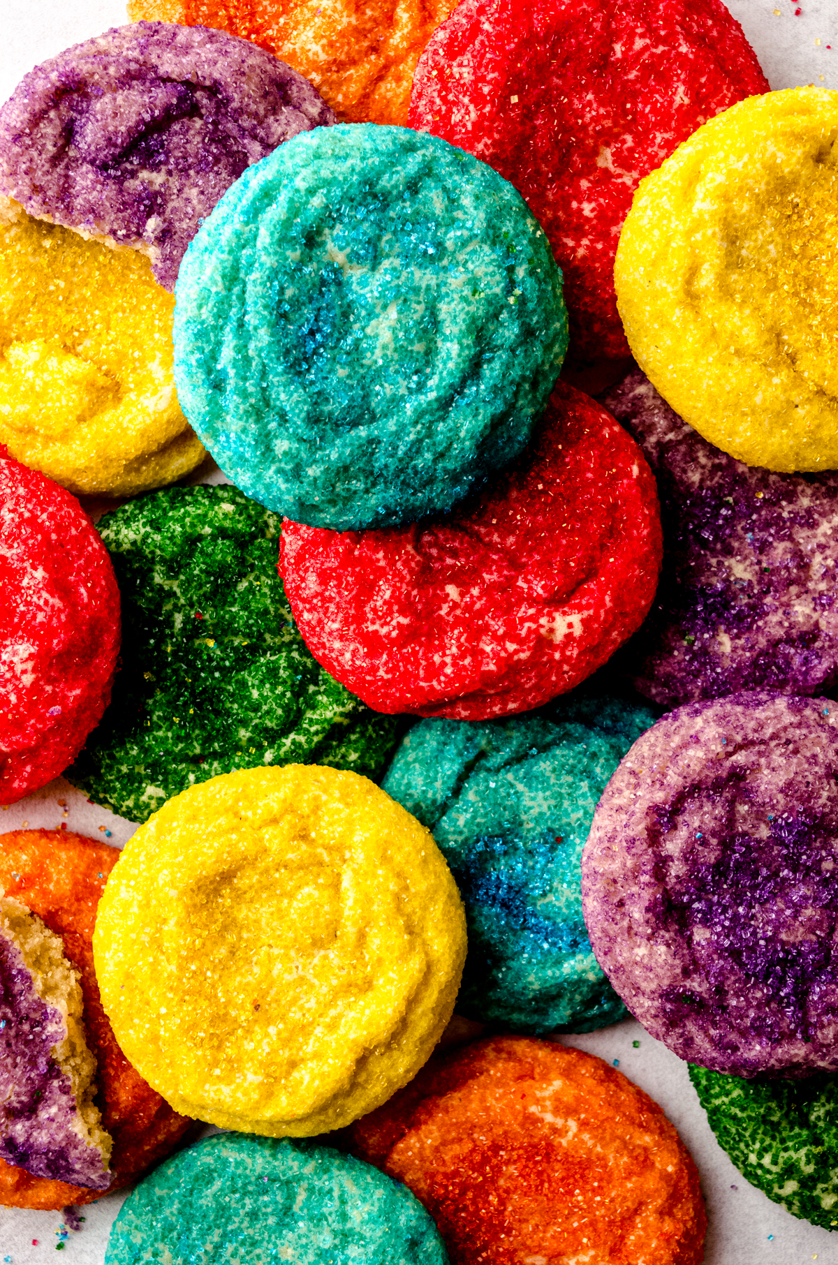 Aerial photo of sugar cookies that have been rolled in colored sugar.