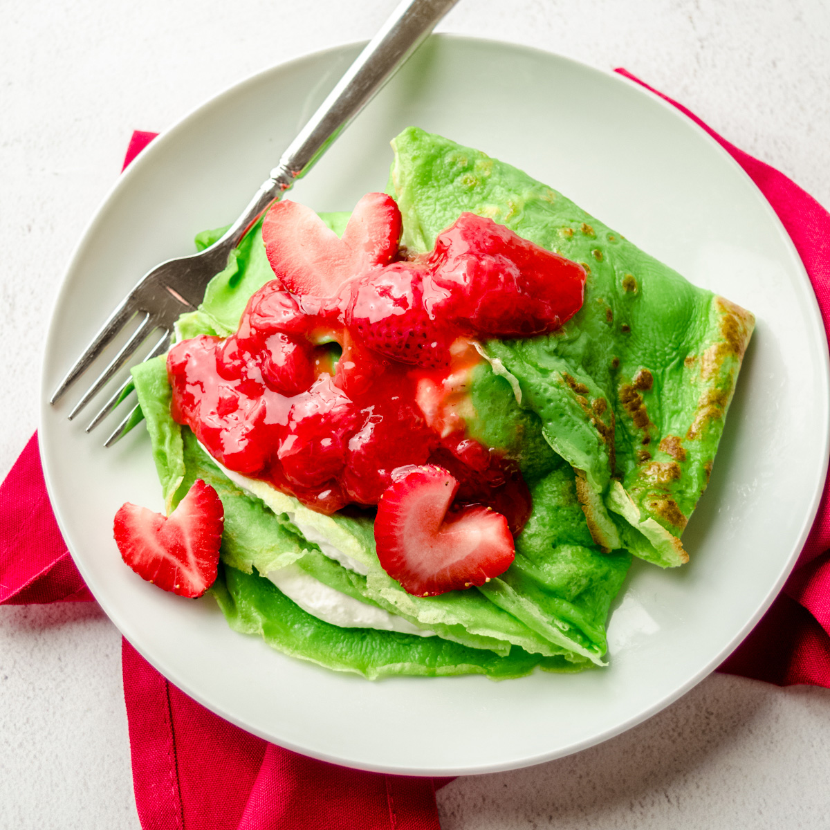 Grinch Crepes (Green Crepes with Strawberry Sauce) - Fresh April 