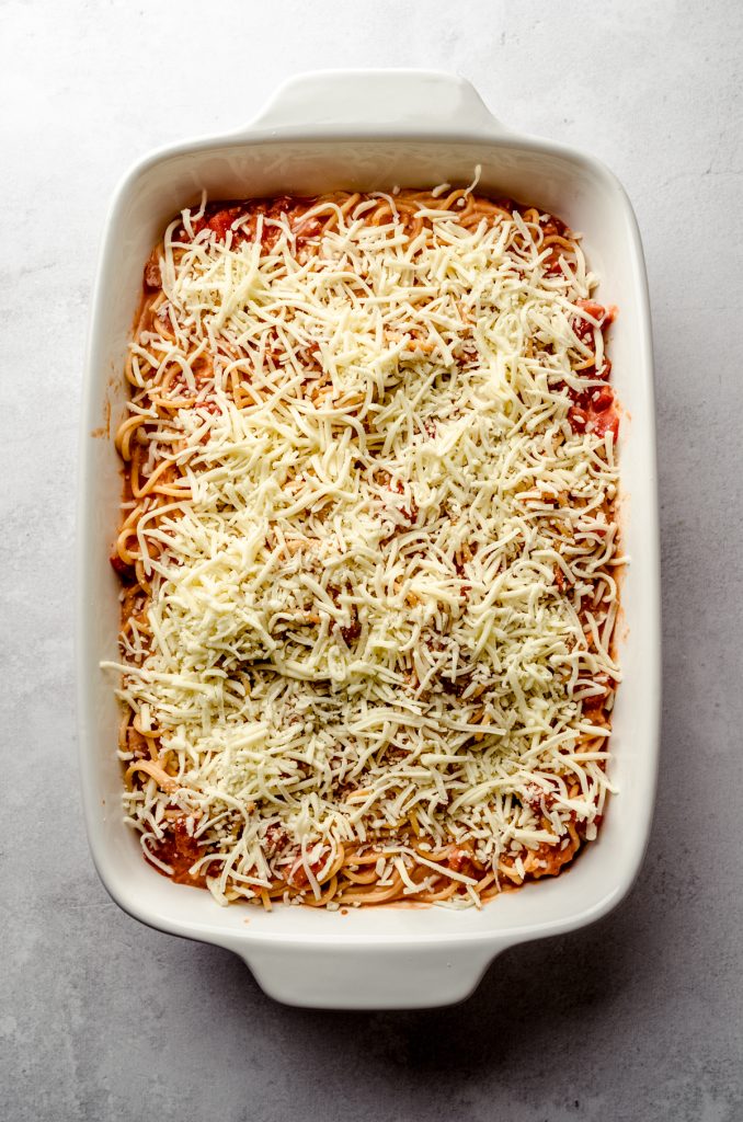 Aerial photo of a casserole of baked spaghetti before going into the oven.