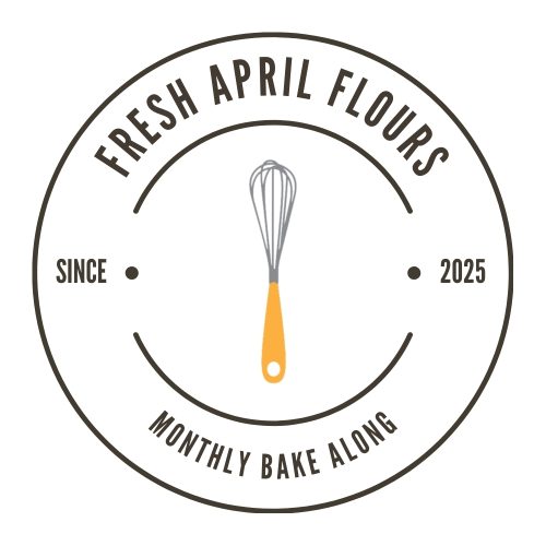 A circle emblem with Fresh April Flours Monthly Bake Along on it with a whisk that has a yellow handle on it in the middle.