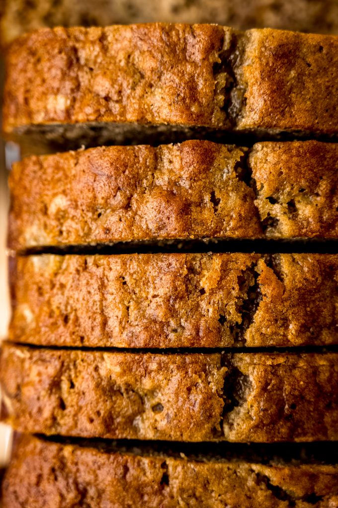 Aerial photo of a loaf of banana bread that has been sliced.