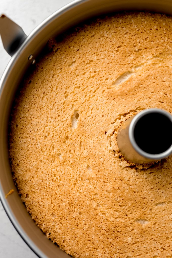 An angel food cake in a tube pan.