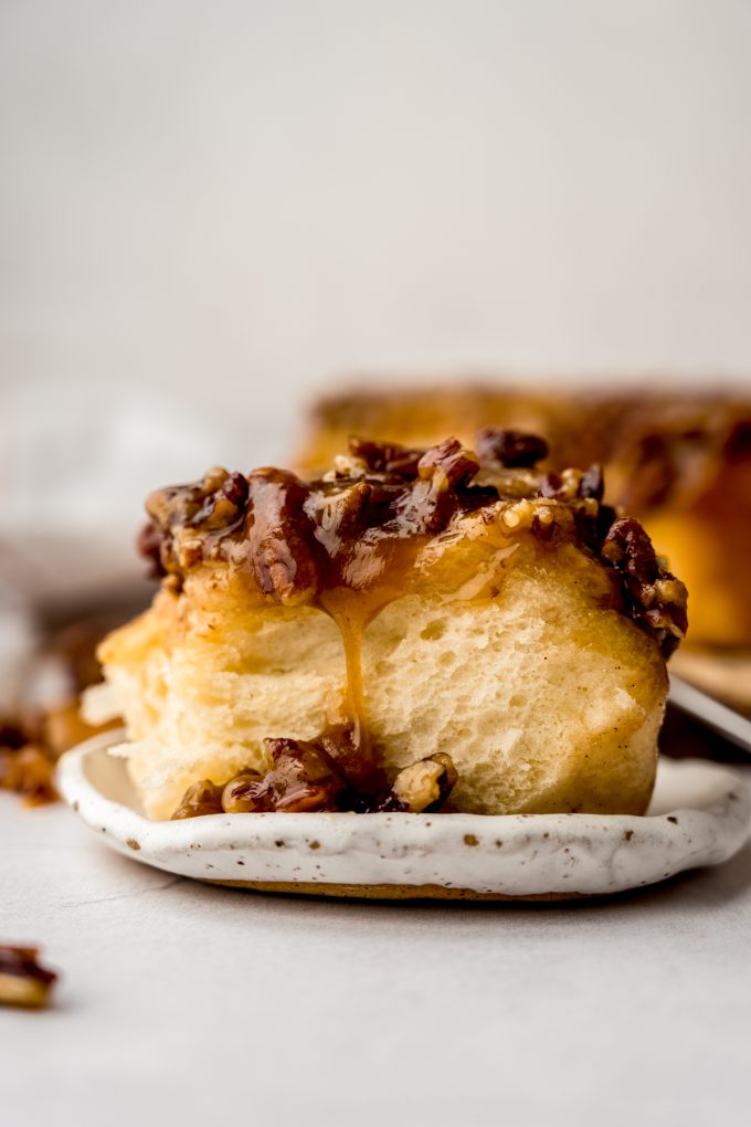 A sticky bun on a plate.