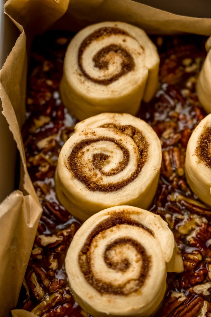 Sticky buns in a baking pan before rising.