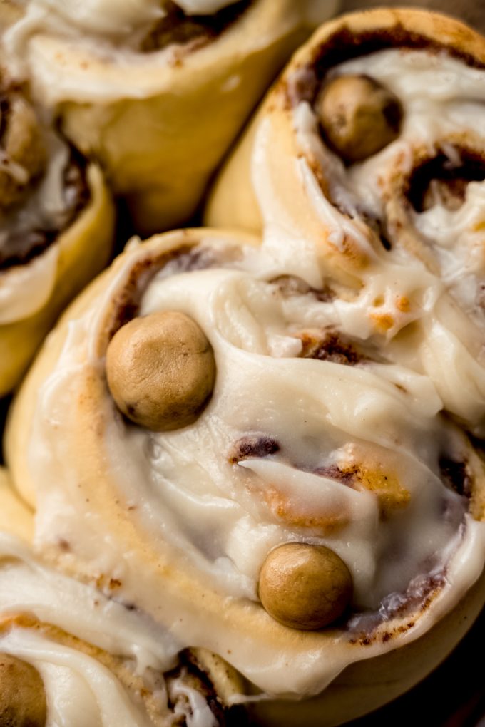 Aerial photo of cookie dough cinnamon rolls on a surface.