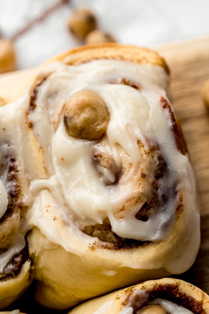 Aerial photo of cookie dough cinnamon rolls on a surface.
