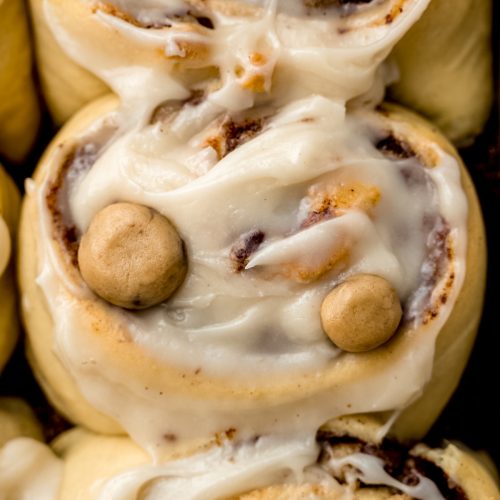 Aerial photo of cookie dough cinnamon rolls in a baking dish.