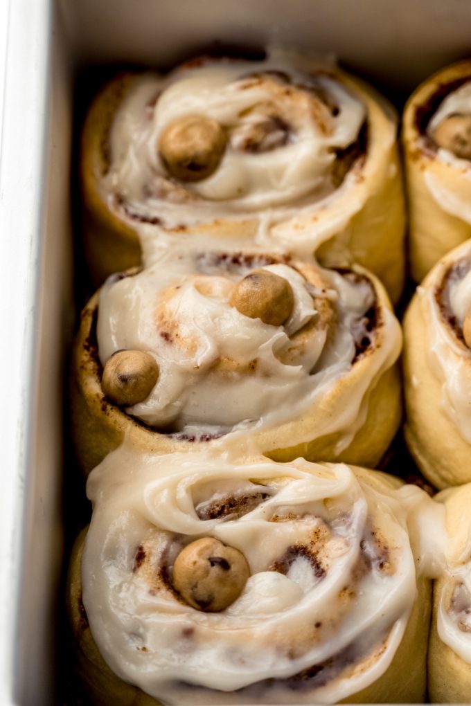 Aerial photo of cookie dough cinnamon rolls in a baking dish.