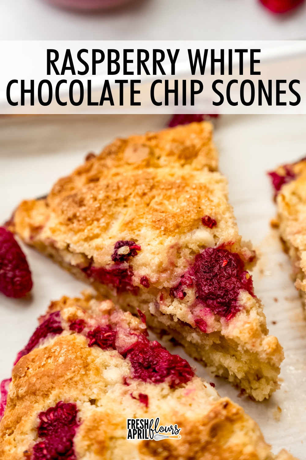 These soft and tender scones are bursting with fresh juicy raspberries and dotted with creamy white chocolate chips in every bite. via @frshaprilflours