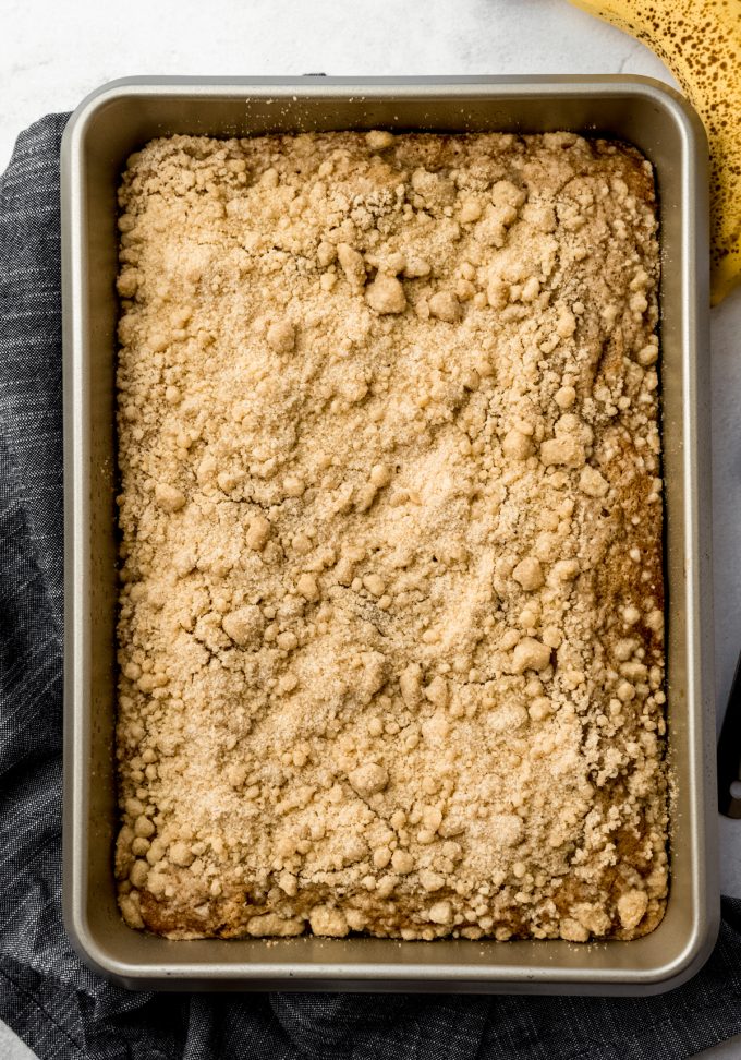 Aerial photo of banana crumb cake in a pan.