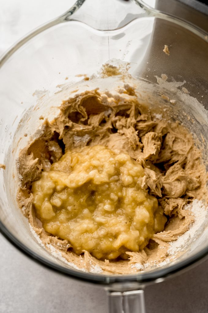 Batter for banana crumb cake in the bowl of a stand mixer.