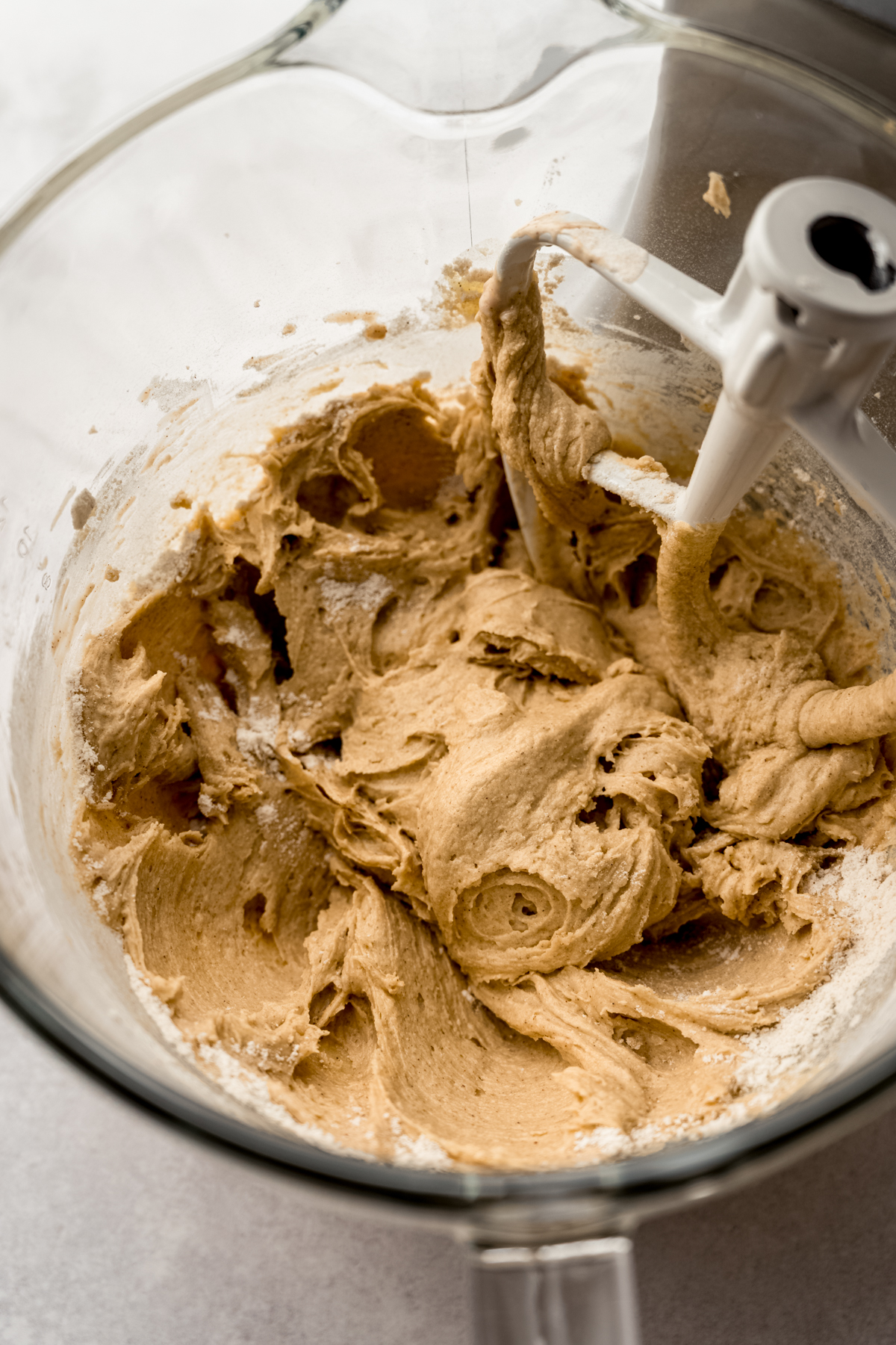Batter for banana crumb cake in the bowl of a stand mixer.
