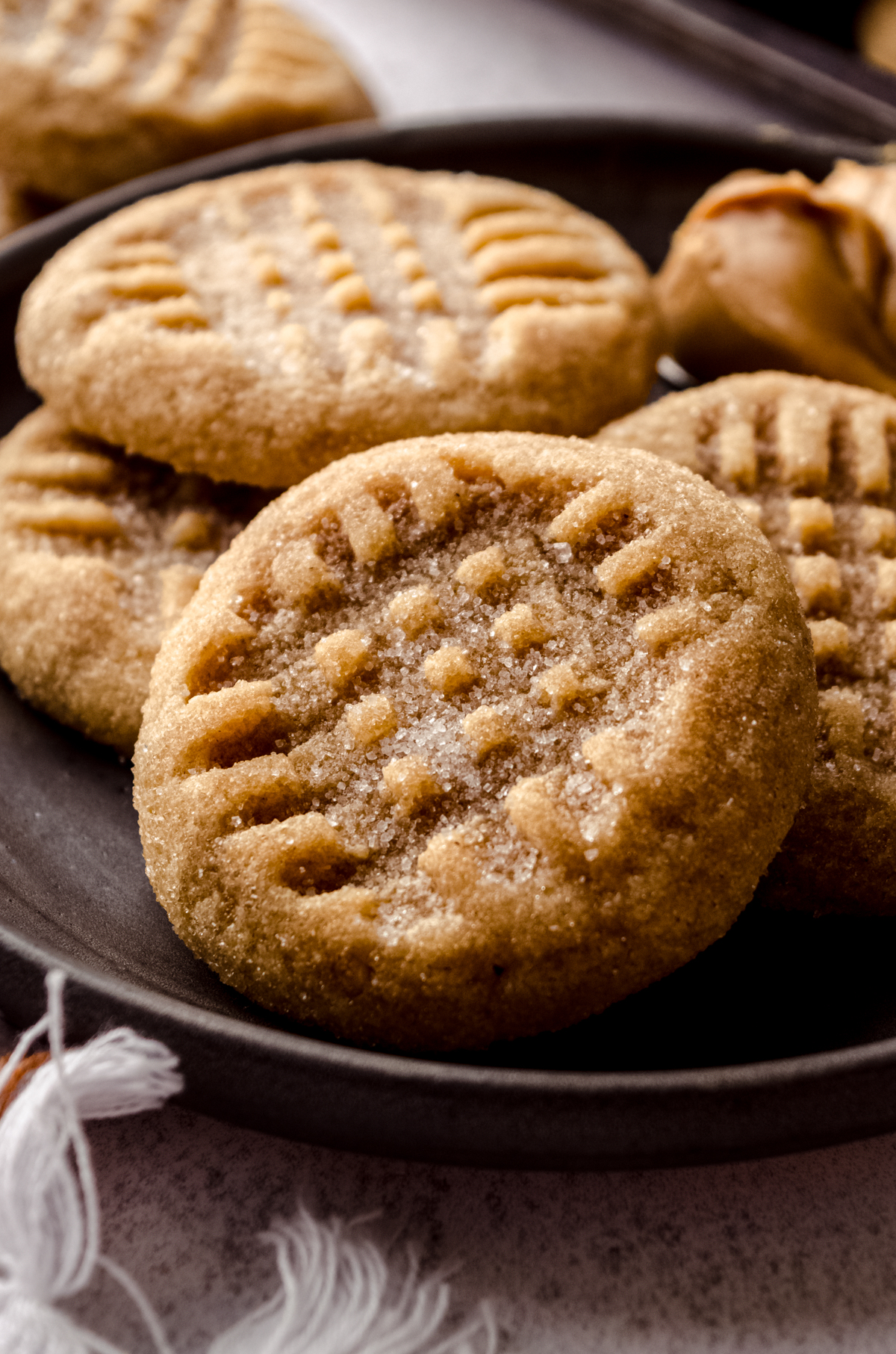 Classic peanut butter cookies on a plate.