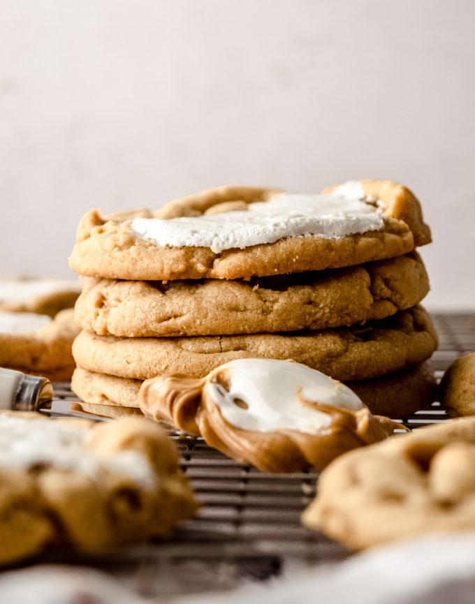 A stack of fluffernutter cookies on a cooling rack.