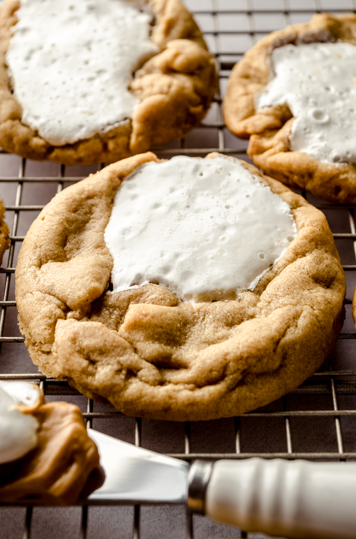 A fluffernutter cookie on a cooling rack.