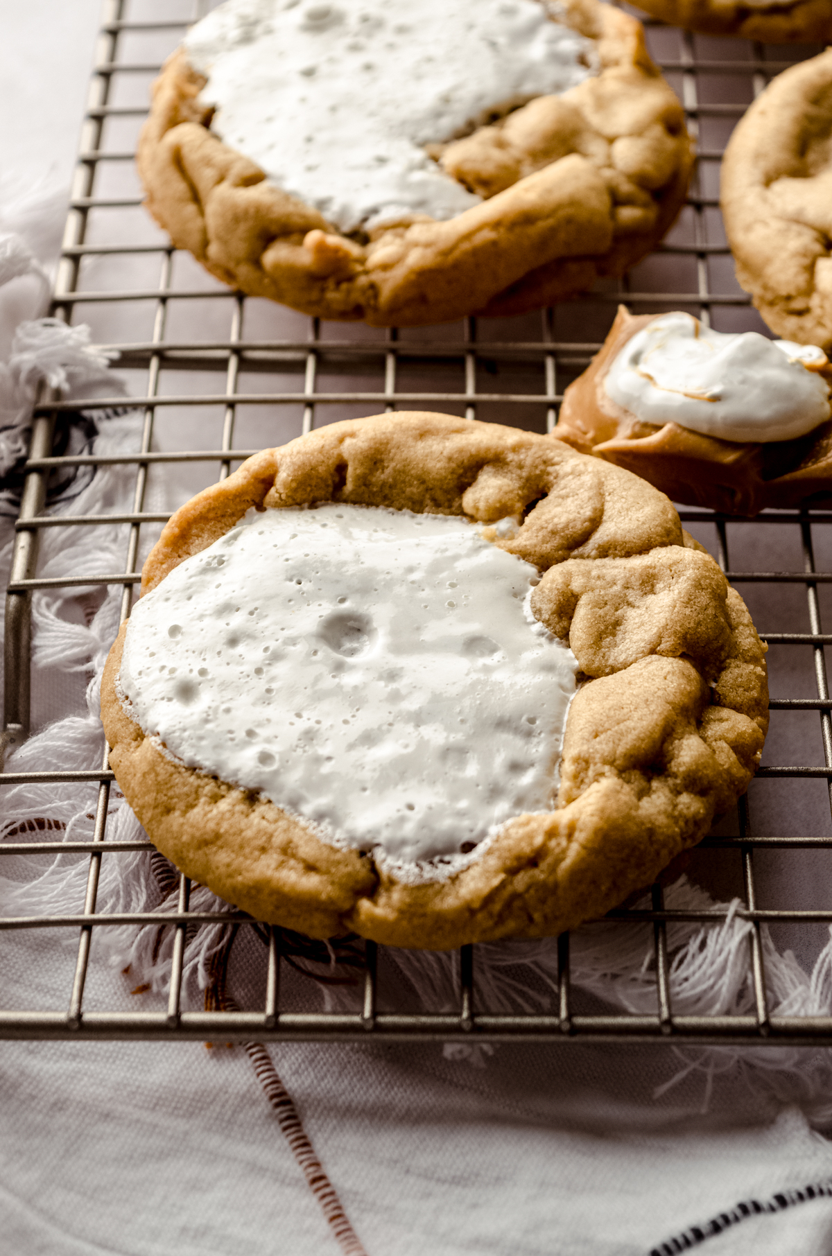 A fluffernutter cookie on a cooling rack.