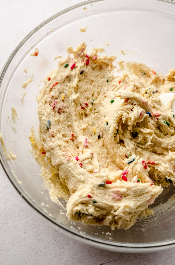 A bowl of funfetti sugar cookie dough.