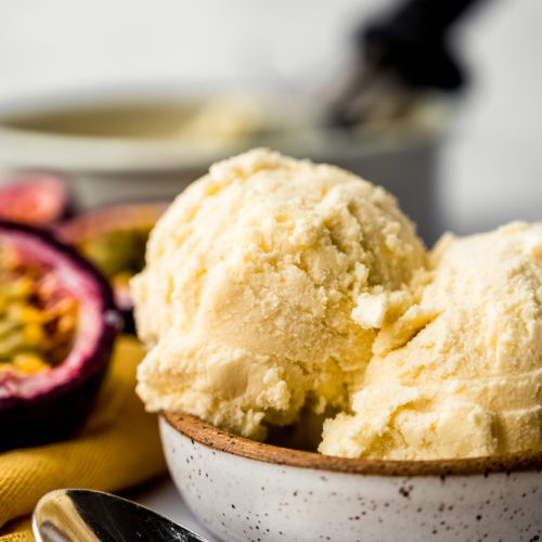 Passion fruit ice cream in a bowl.