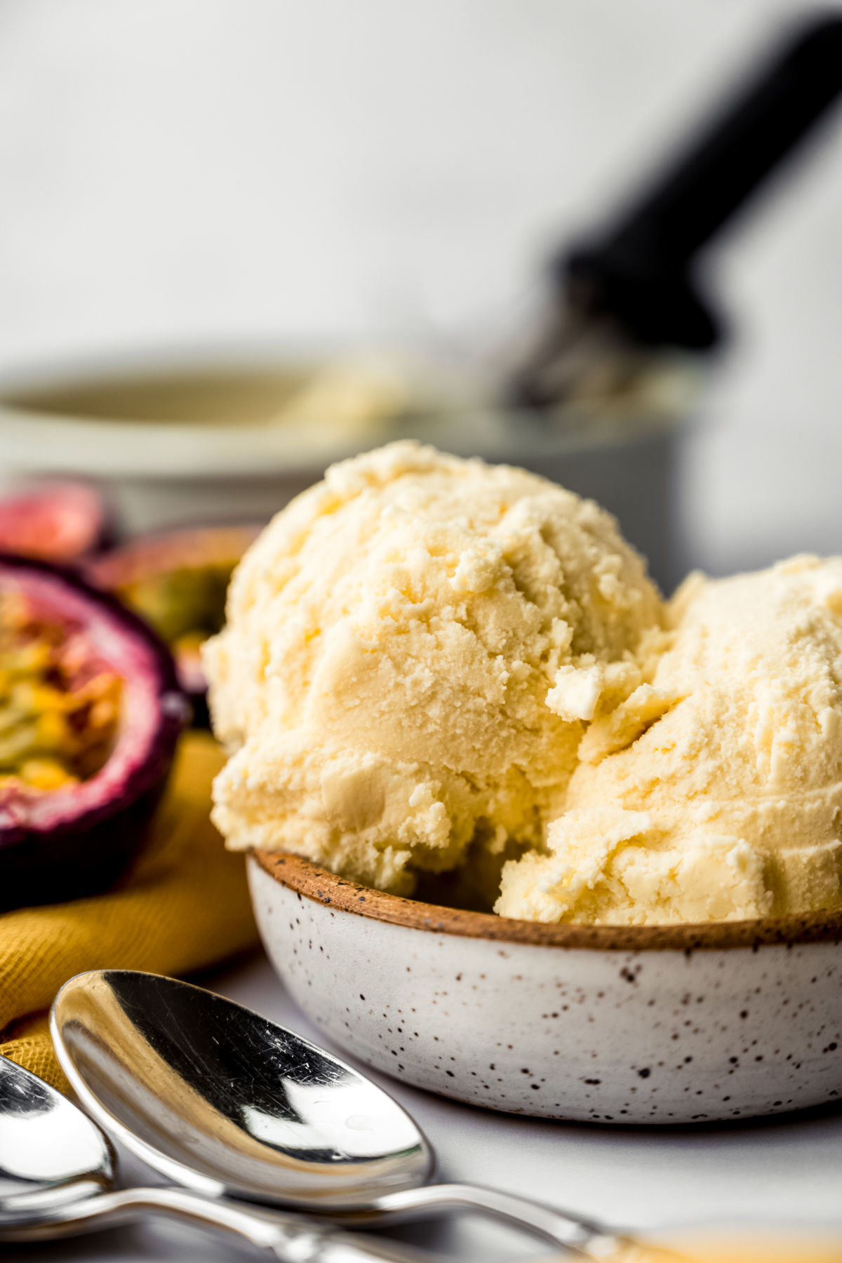 Passion fruit ice cream in a bowl.