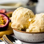Passion fruit ice cream in a bowl.