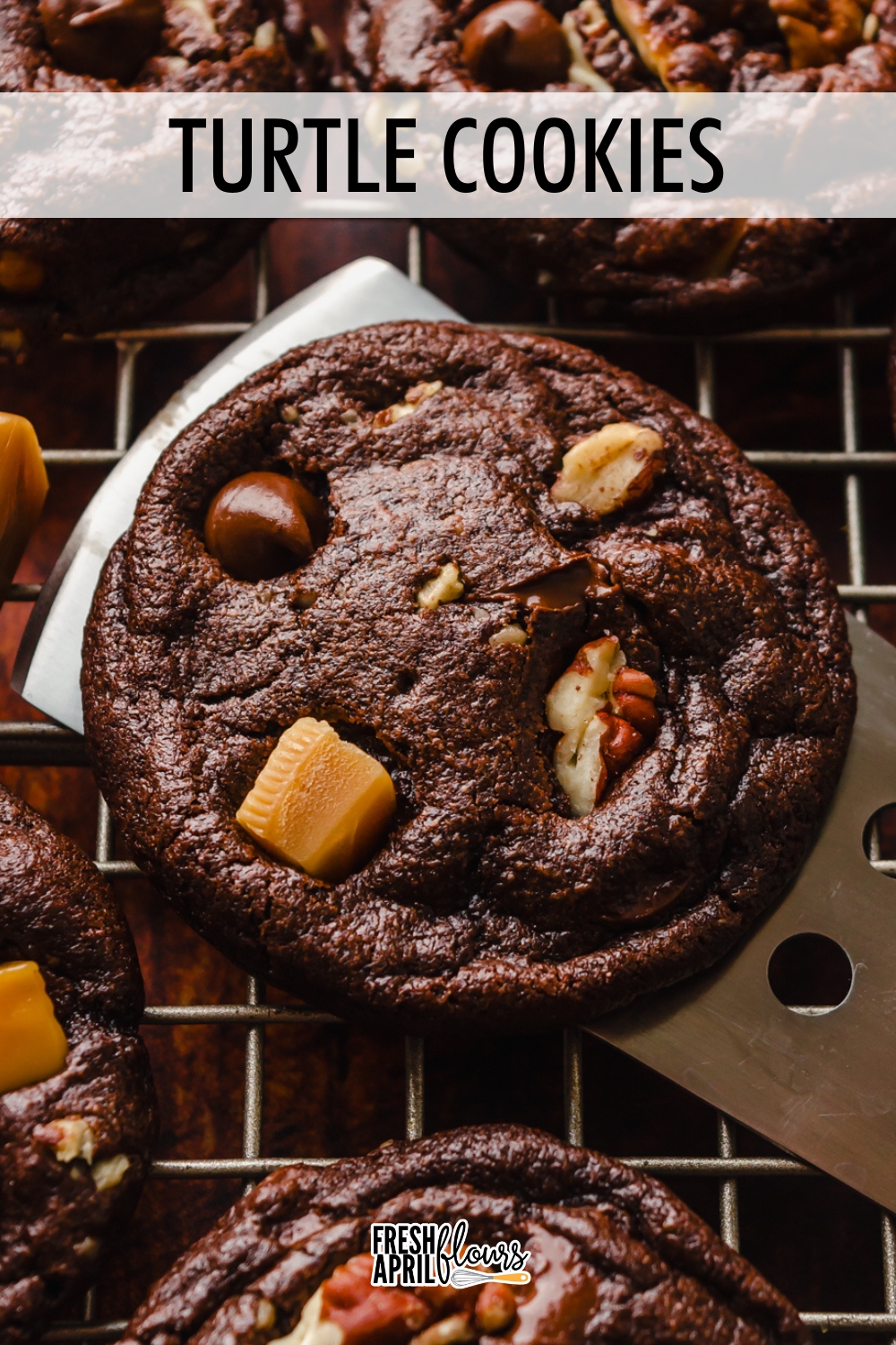 Modeled after the popular chocolate covered candy, these chocolate turtle cookies start with a decadent chocolate cookie that's filled with creamy chocolate chips, gooey caramel, and nutty toasted pecans. They're a mix of sweet, salty, gooey, chewy, and crunchy. via @frshaprilflours