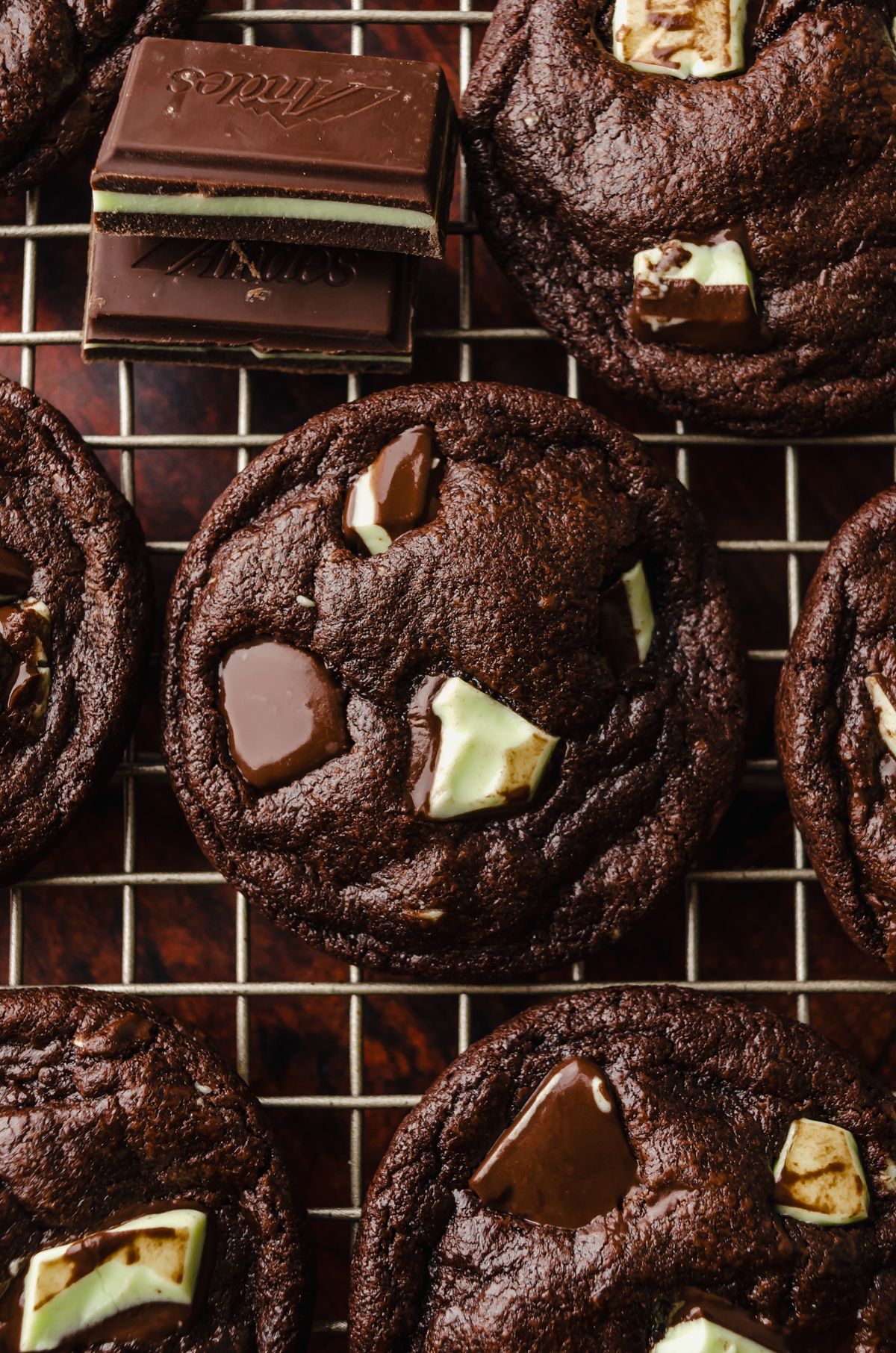 Aerial photo of chocolate mint cookies on a cooling rack.