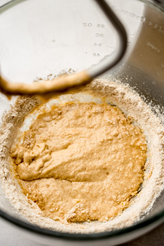 S'mores cinnamon roll dough ingredients coming together in the bowl of a stand mixer.
