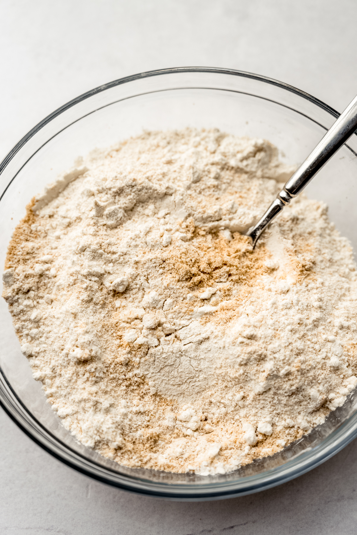 A bowl of the dry ingredients to make s'mores cinnamon rolls.