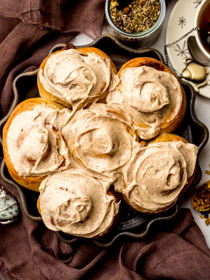 Aerial photo of a baking dish with chai cinnamon rolls in it.
