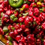 A closeup of cranberry salsa in a bowl.