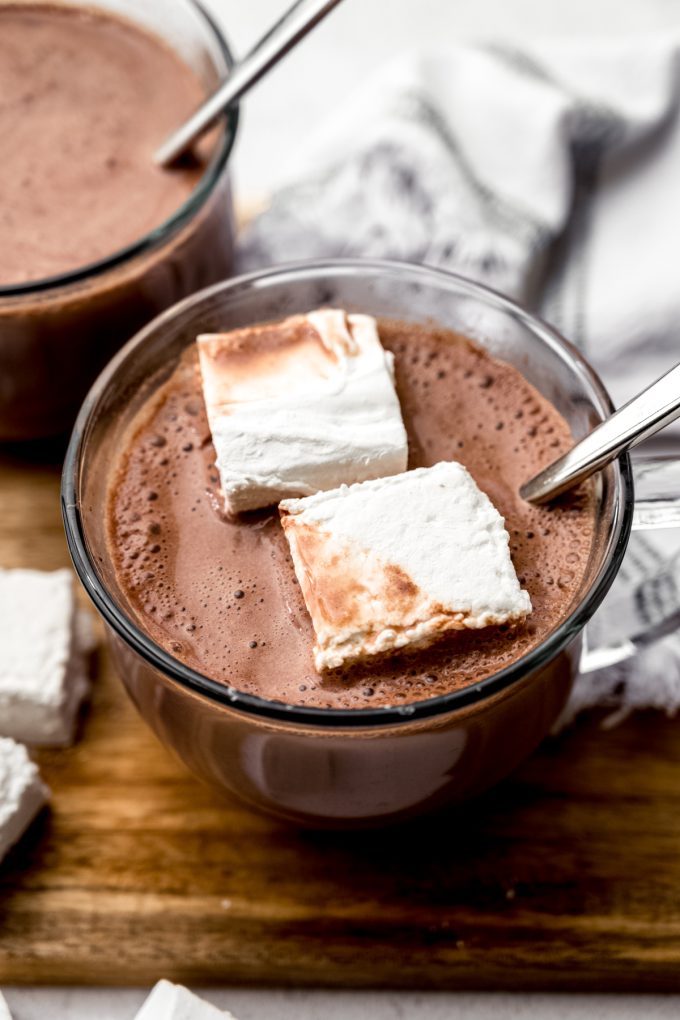 A mug of hot cocoa with homemade marshmallows in it.