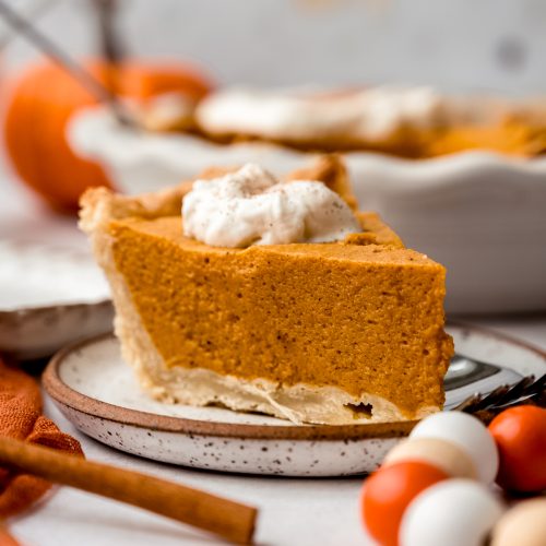 A slice of pumpkin chiffon pie on a plate.