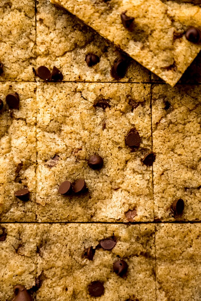 Aerial photo of chocolate chip cookie bars in a pan.