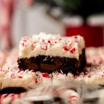 Peppermint bark cookie bars on a surface.