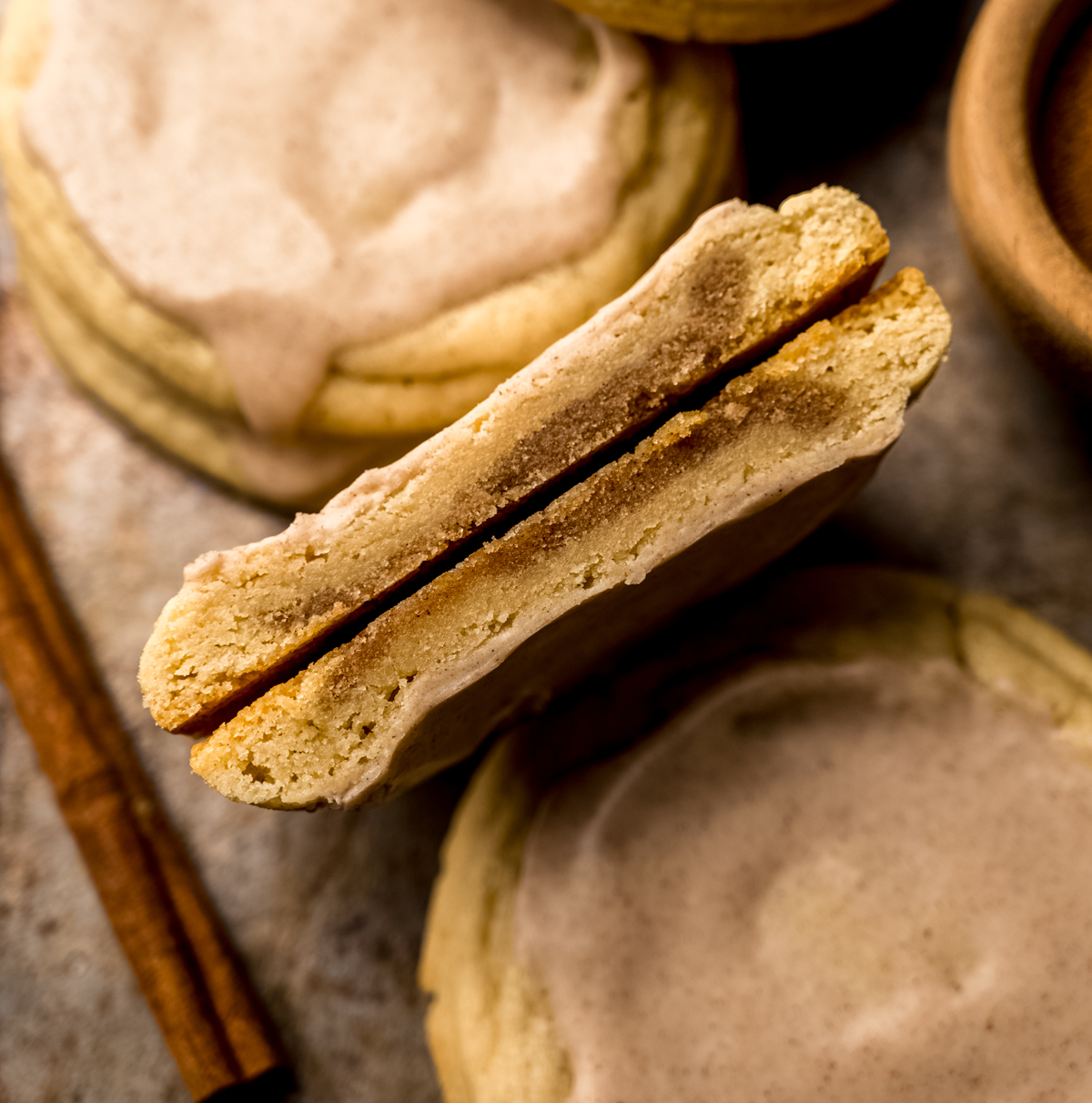 A brown sugar Pop Tart cookie that has been cut in half so you can see the inside of it.