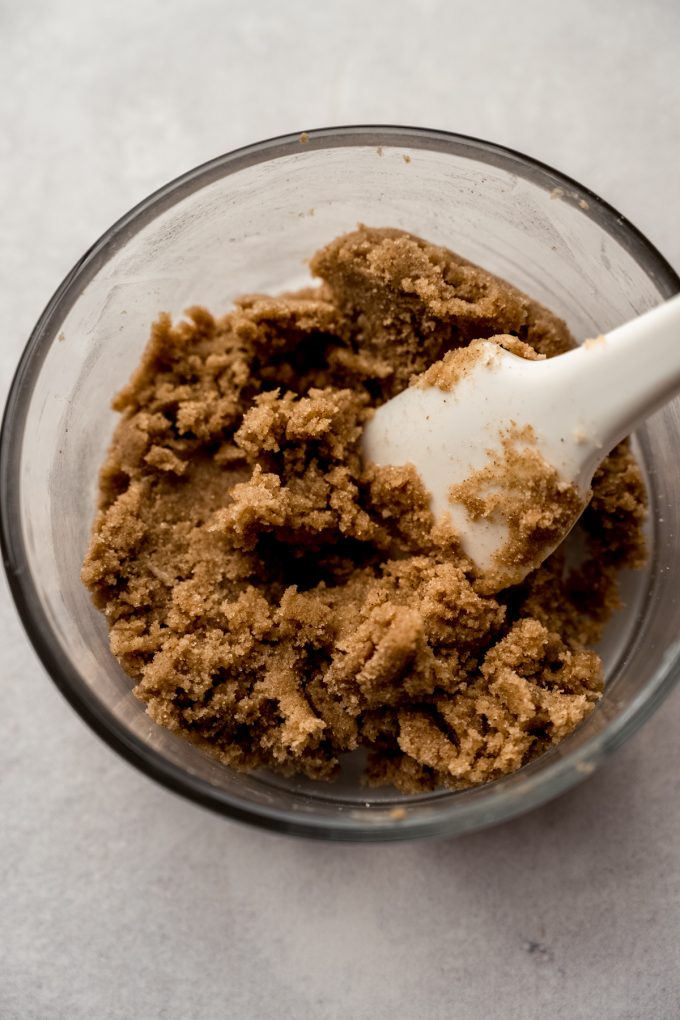 A bowl of the filling for brown sugar Pop Tart cookies with a spatula in it.
