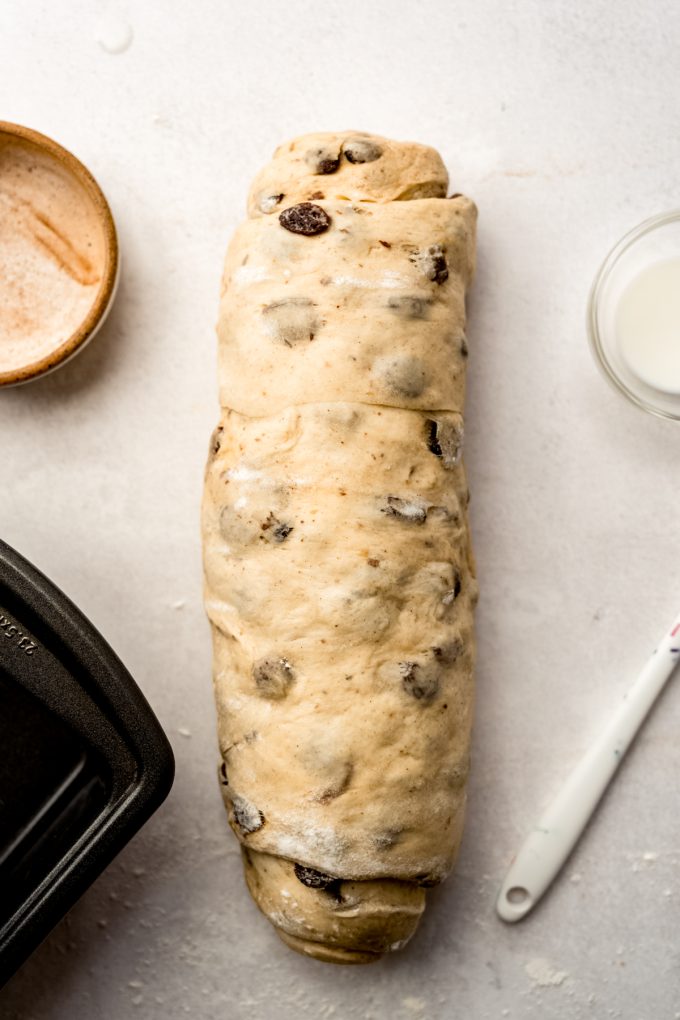 A log of cinnamon raisin bread dough.