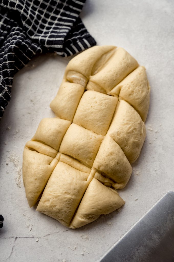 Slider roll dough portioned into sections.